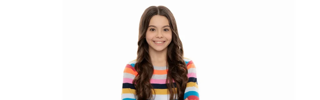 happy client of sd clinick wearing multi color shirt and smiling